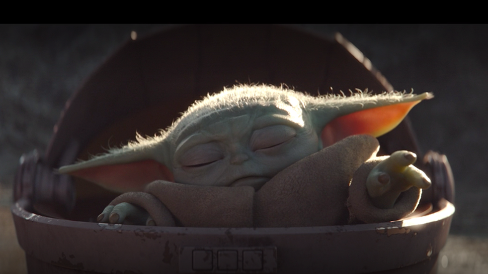 Baby Yoda och hans gulliga öron sover. Zzzzzzz