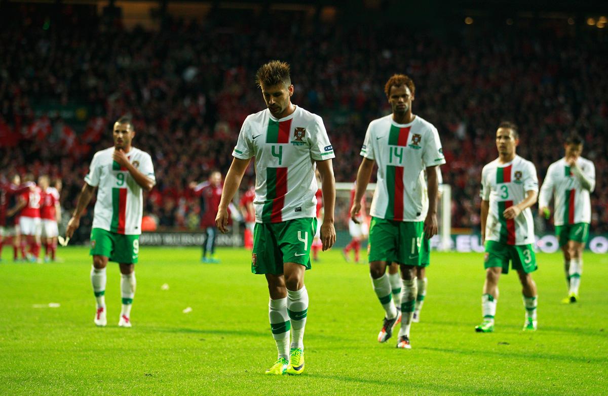 Portugal får spela playoff efter förlust borta mot Danmark.