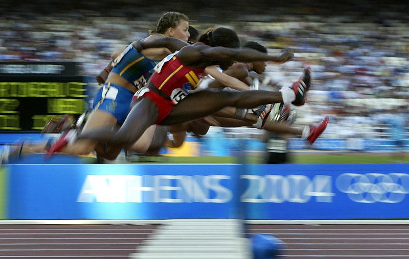 OS-start Susanna Kallur i aktion vid OS-semifinalen i Aten 2004, ett lopp där hon slutade sjua.