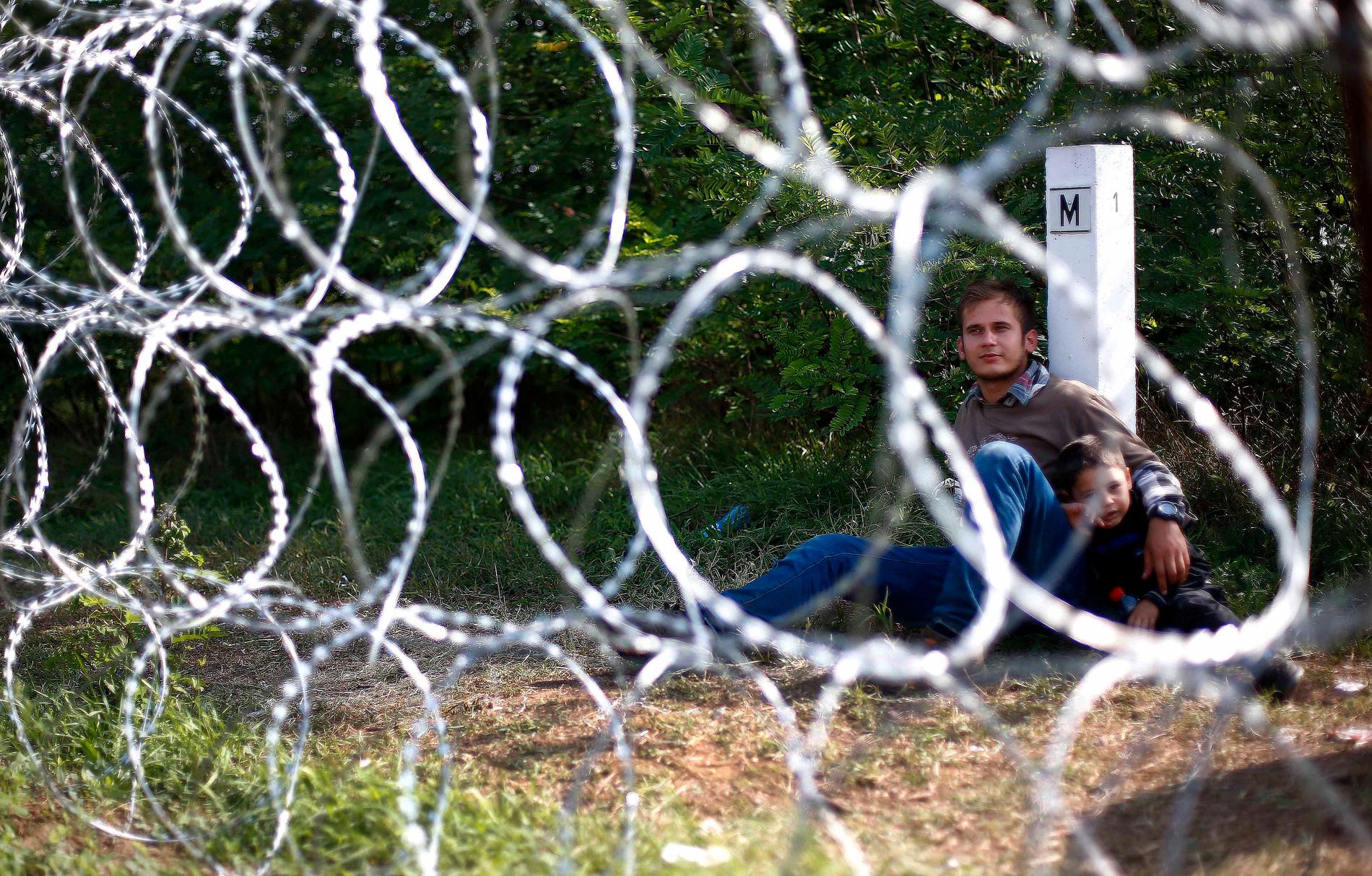 En ung man med sin son har stoppats vid gränsen till Ungern.