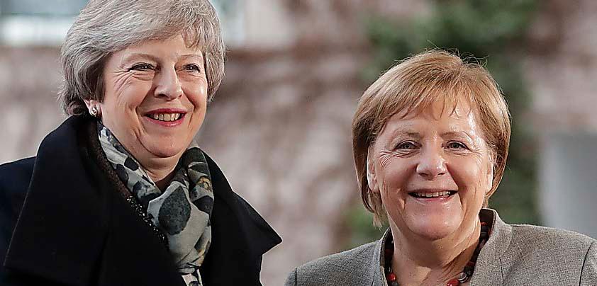 Theresa May och Angela Merkel – mäktiga kvinnor utan barn.