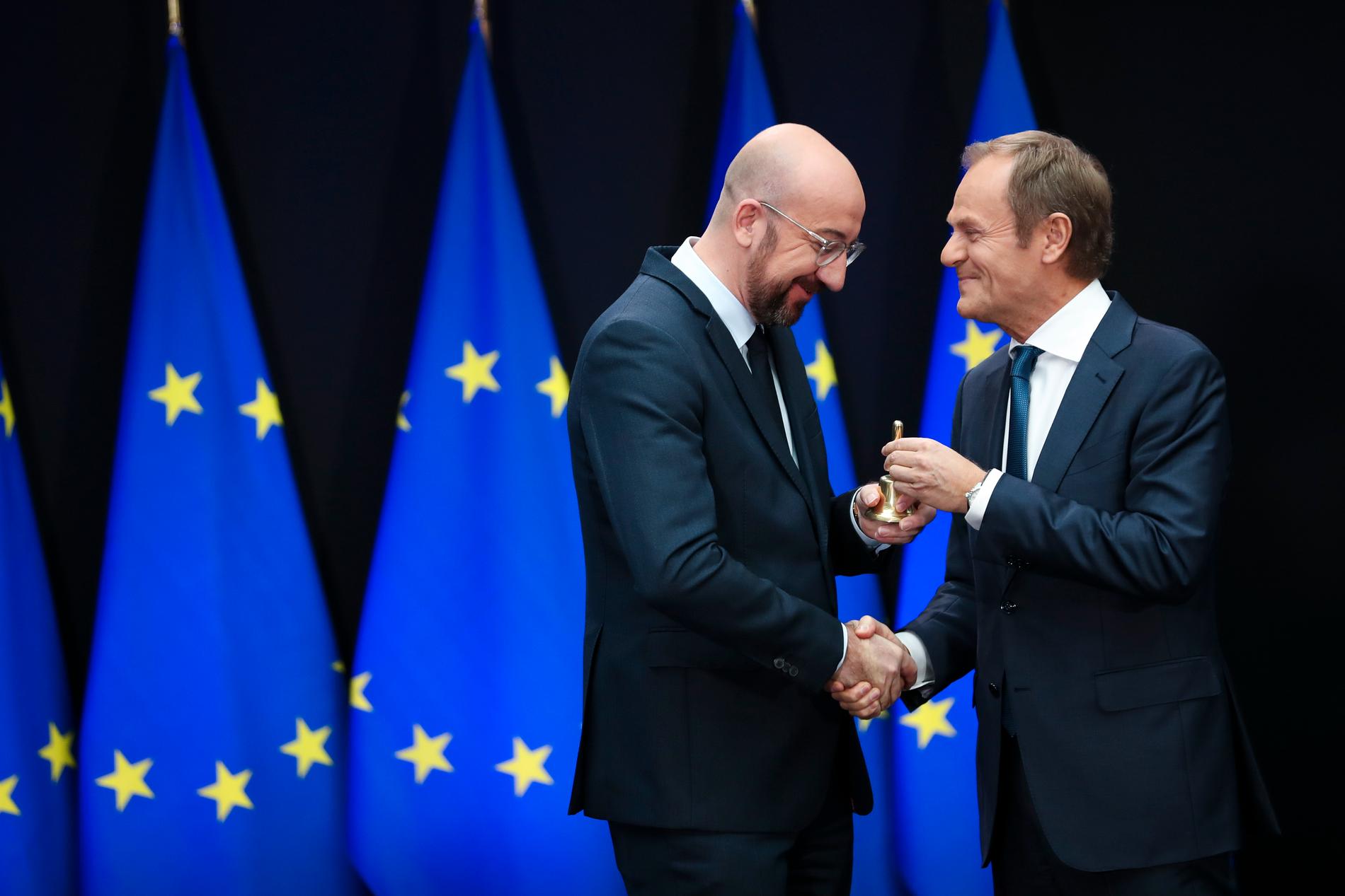 Belgiens nyavgångne premiärminister Charles Michel (till vänster) tar över som EU:s permanente rådsordförande efter Donald Tusk (till höger).