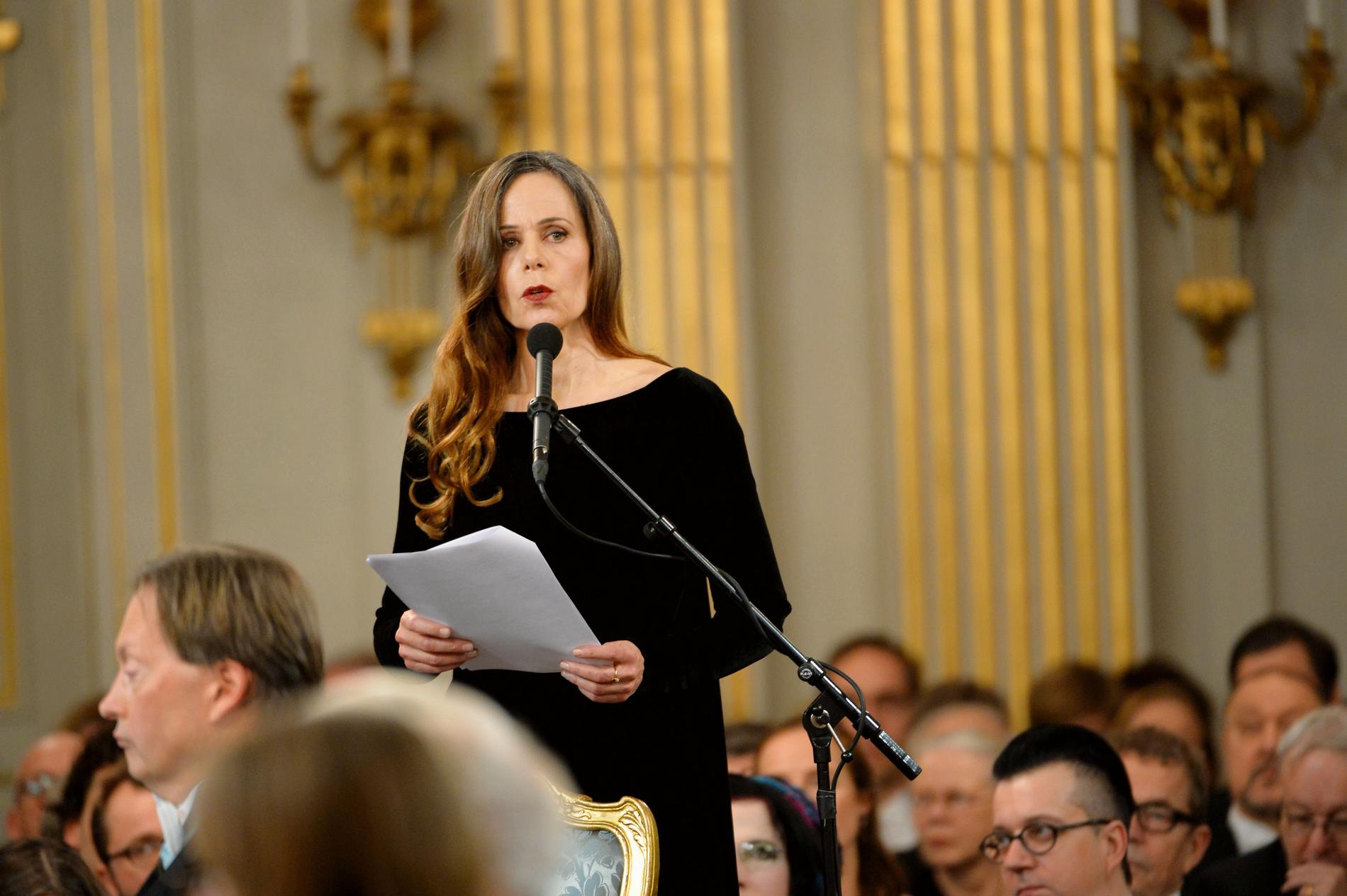 Sara Danius tar plats i Svenska Akademien under den traditionella högtidssammankomsten i Börshuset i Stockholm den 20 december 2013.
