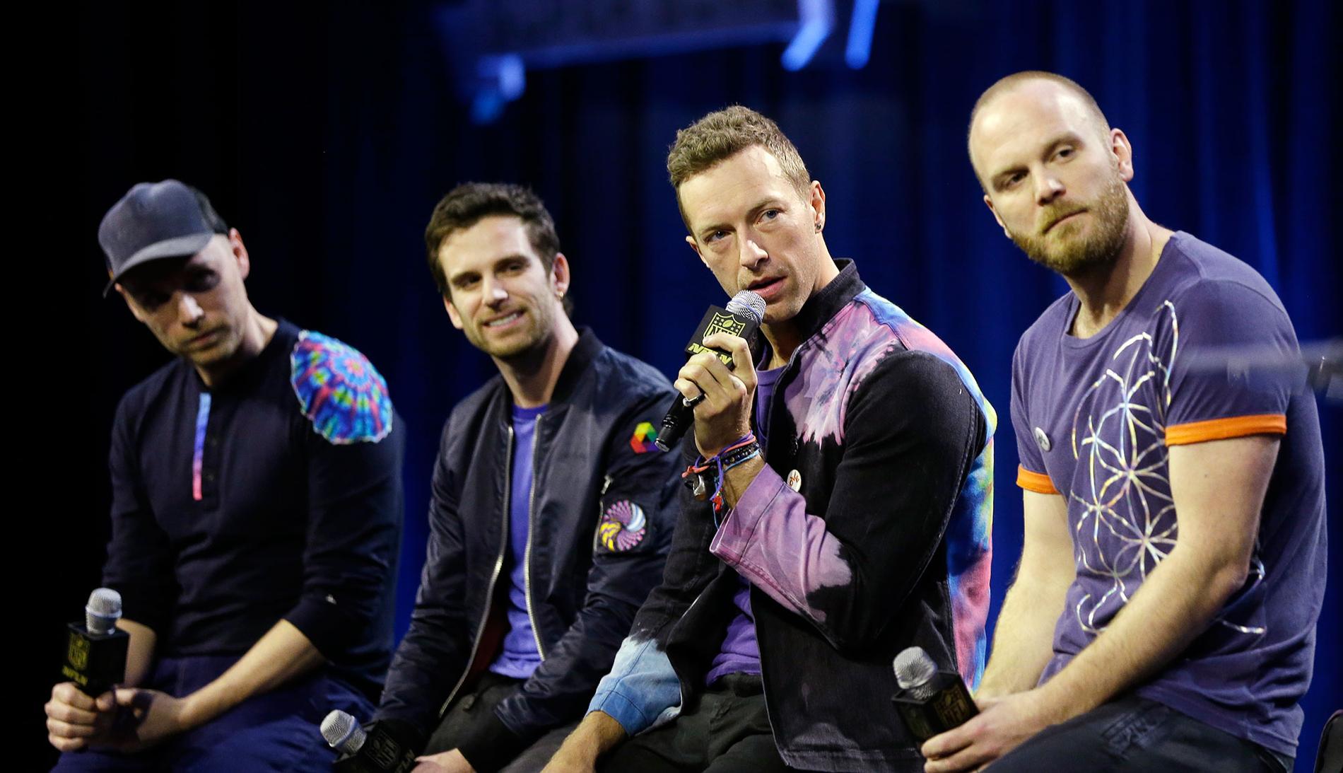 Jonny Buckland, Guy Berryman, Chris Martin och Will Champion i Coldplay.
