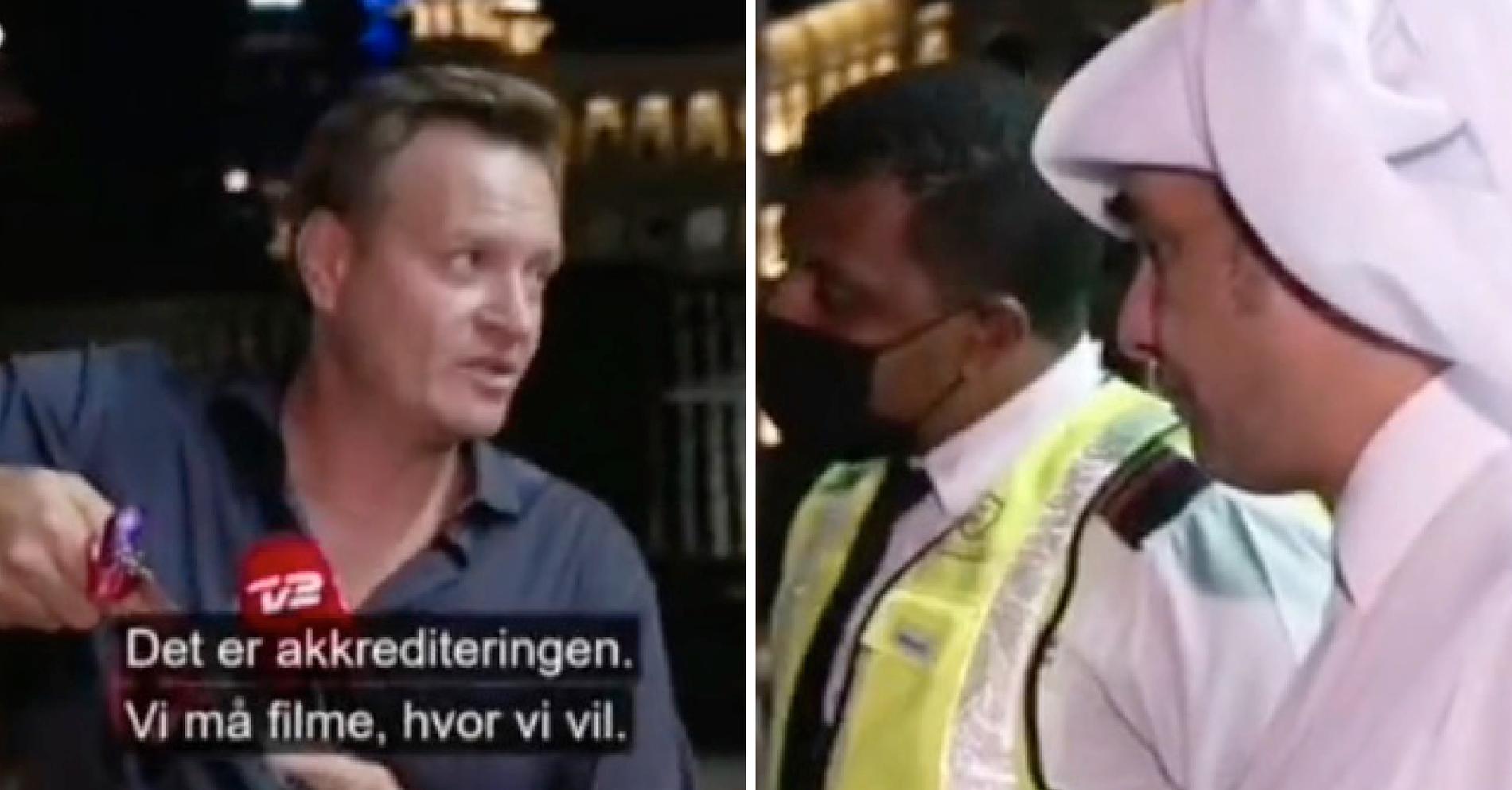 Här avbryter vakter danska TV2-journalisten Rasmus Tantholdt mitt i livesändningen.