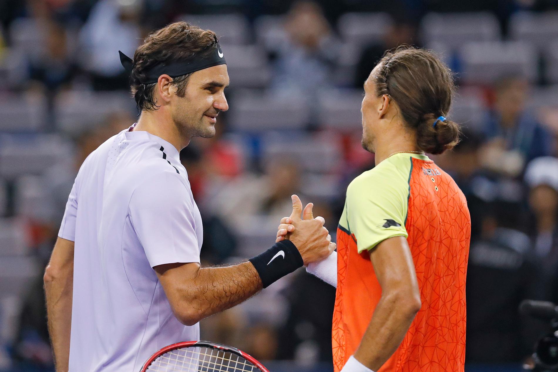 Roger Federer och Alexandr Dolgopolov.