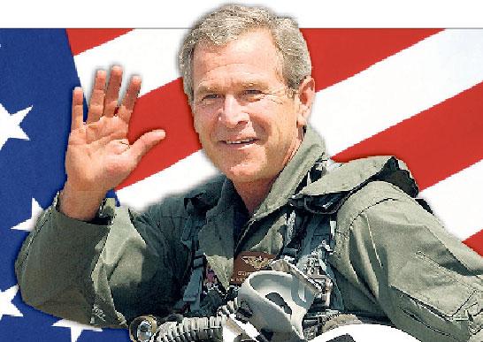 MISSION ACComplished George W Bush innan han byter om till kostym och håller sitt segertal inför soldaterna på hangarfartyget USS Abraham Lincoln.
