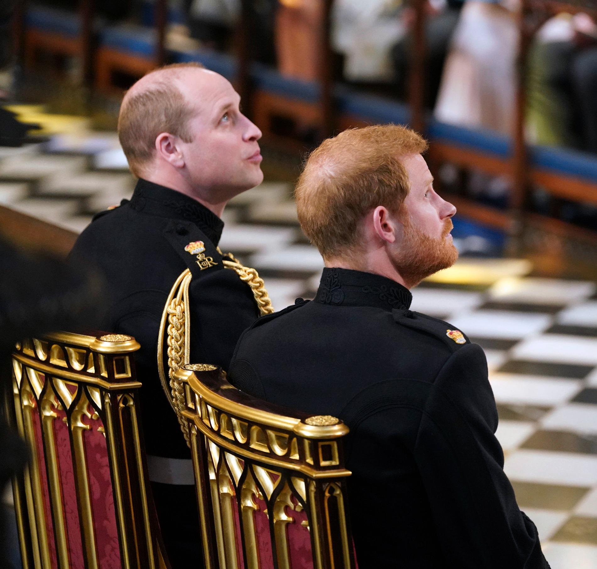 Prins William och prins Harry i Windsor castle vid bröllopet mellan Harry och Meghan 2018.