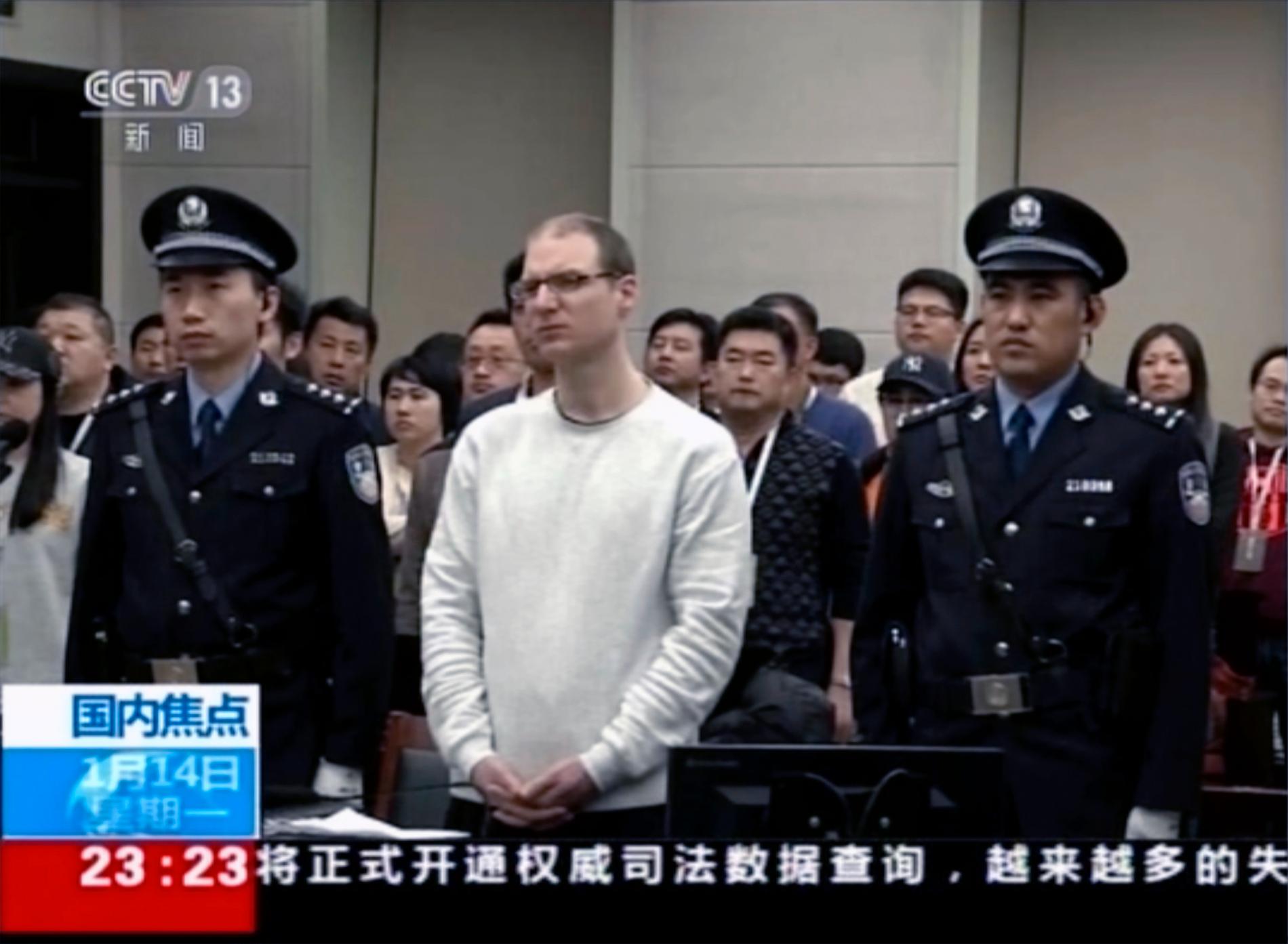 Kanadensaren Robert Lloyd Schellenberg i rätten. Tv-bilder från kinesiska CCTV.