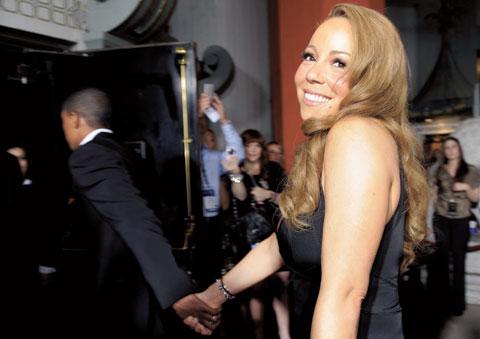 PREMIÄR-PRIMADONNA. Mariah Carey med ­maken Nick Cannon på väg in till premiären av ’’Precious’’.