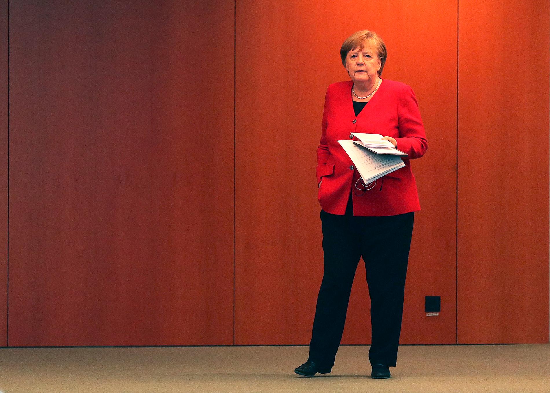 Angela Merkel iklädd  en av sina kavajer.