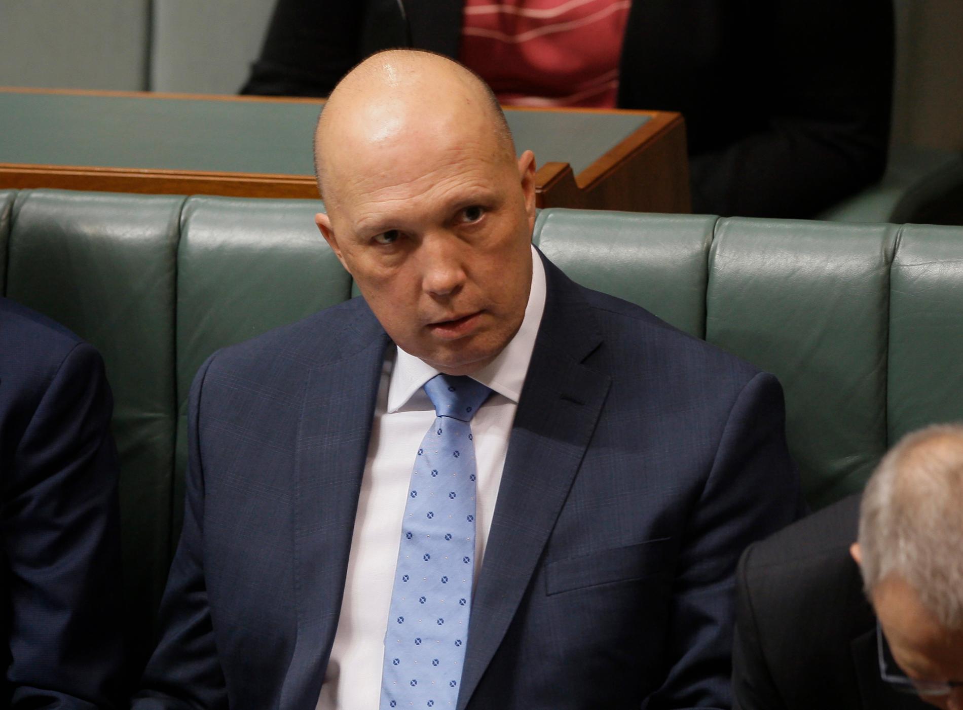 Australiens inrikesminister Peter Dutton säger sig vara orolig för den räckvidd och inflytande som Sonnenkrieg Division anses ha över unga australier. Arkivbild.