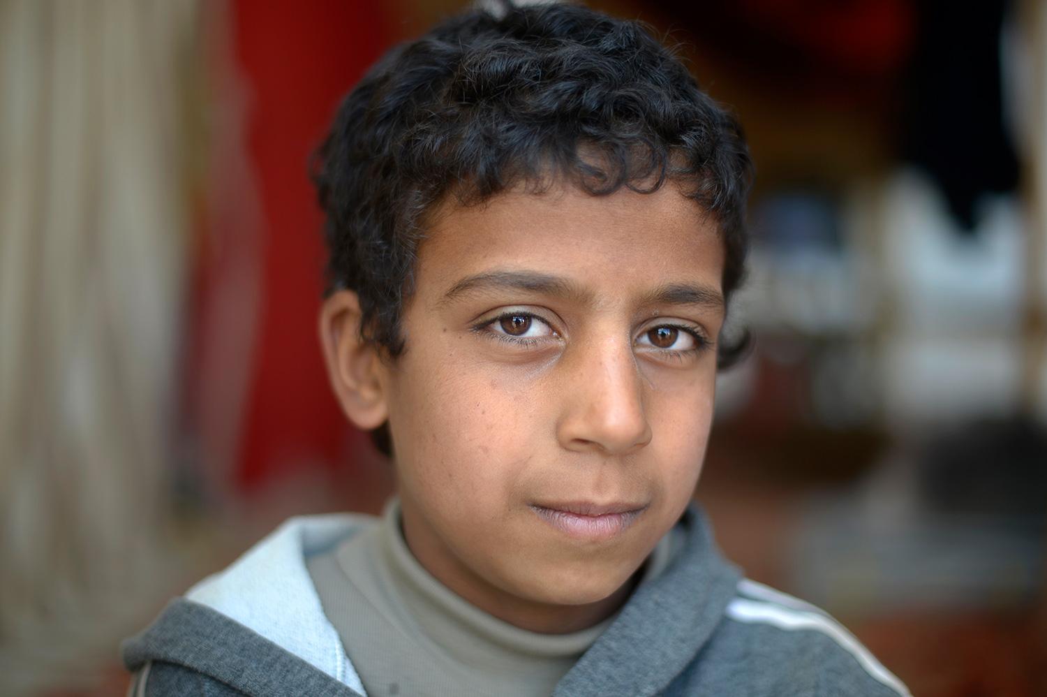 Vad drömmer du om? Omar, 11: Att allt var som förut. Att jag fick åka tillbaka till min by och träffa mina vänner och gå i skolan.