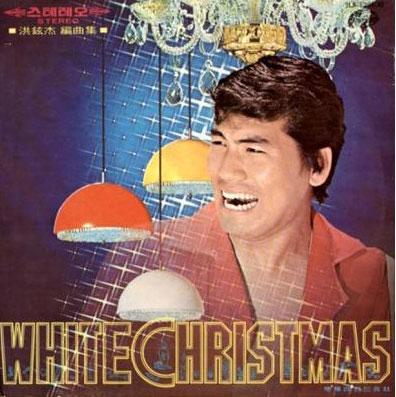 Okänd artist Den okända artisten önskar en vit jul inte bara för stämningens skull utan även för sitt tandgarnityr skull. Maken till vita tänder har inte skådats på någon julskiva.