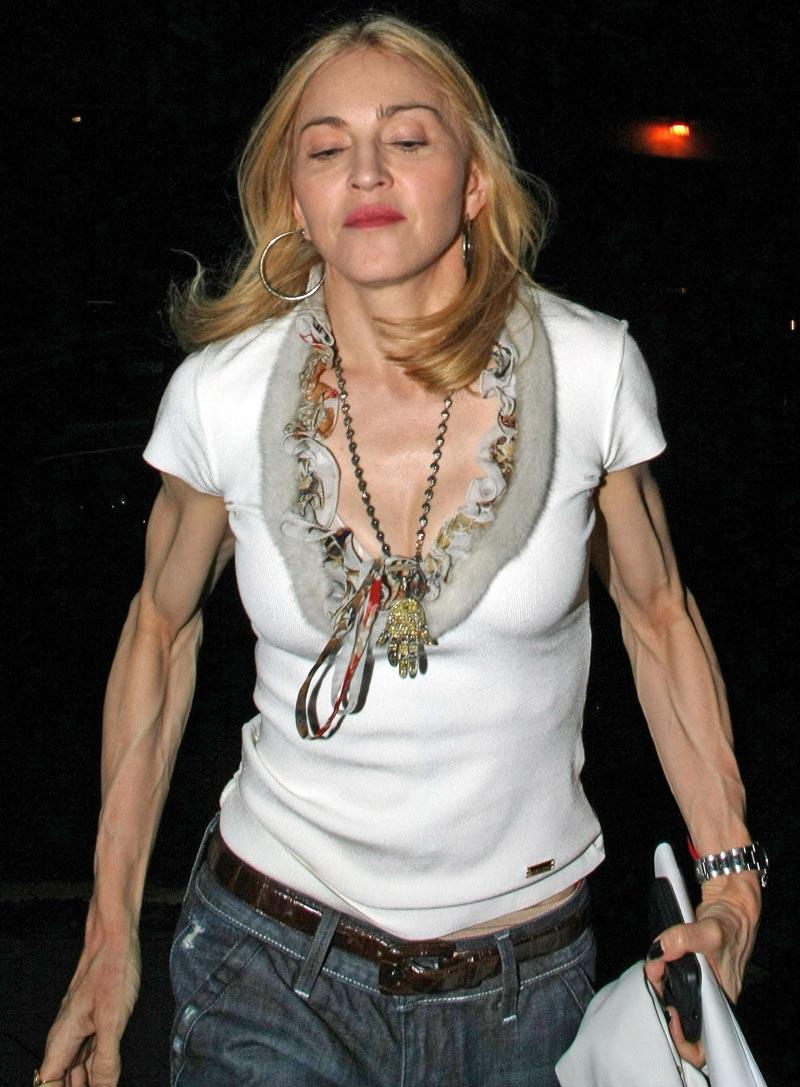 Bilden på Madonnas seniga armar uppges vara falsk.
