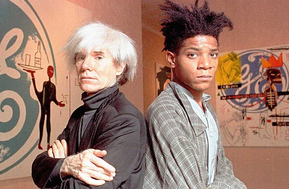 Andy Warhol och Jean-Michel Basquiat på en utställning 1985. Warhol var som en fadersfigur för den unge svarta målaren.