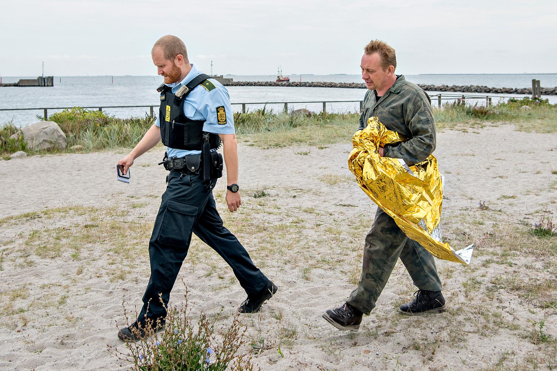 Peter Madsen grips av polis den 11 augusti 2017 efter att hans ubåt sjunkit.