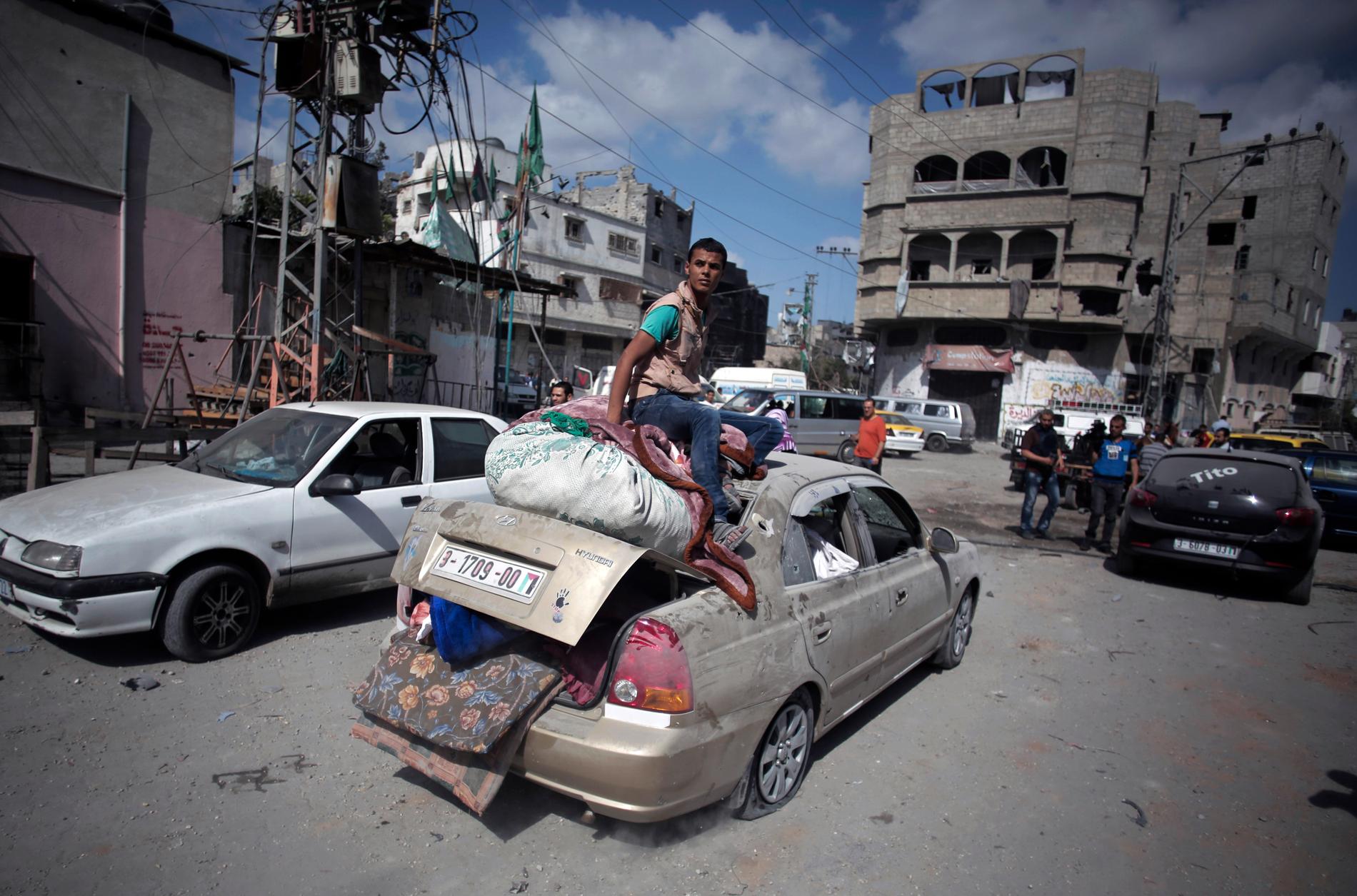 Civila palestinier på flykt undan den kommande invasionen. 