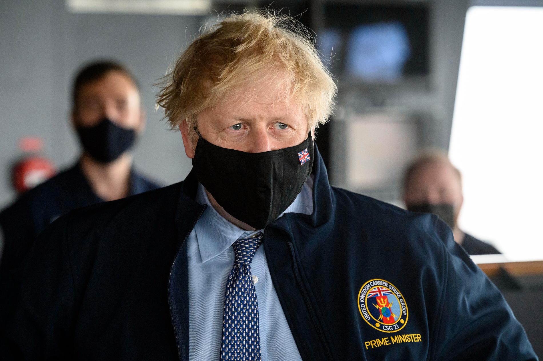 Boris Johnson med munskydd.