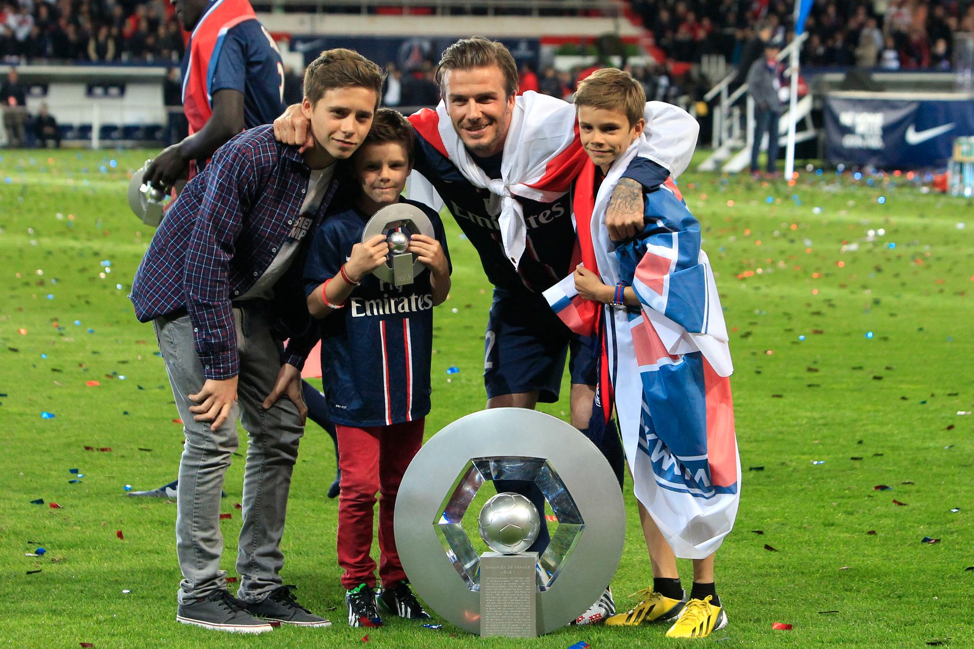 David Beckham med sönerna Brooklyn, Cruz och Romeo i PSG 2013.