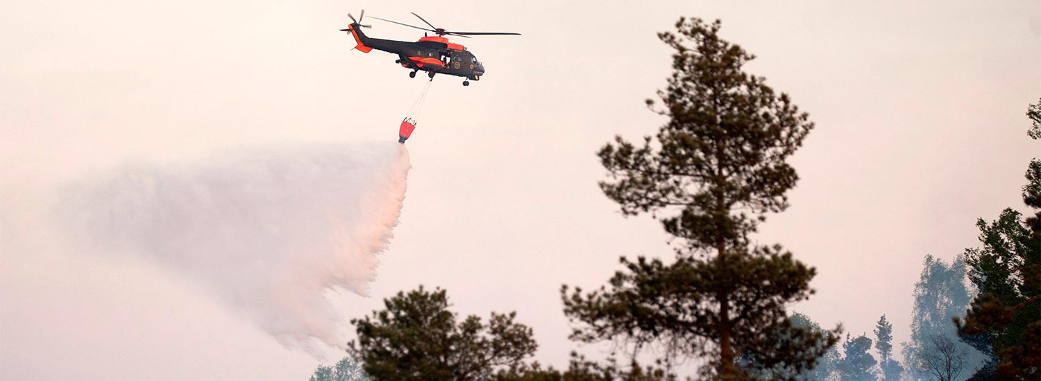Helikoptern, en superpuma från Norrbottens flygflottilj, fick inte börja bekämpa skogsbranden. 
Bilden är tagen vid ett tidigare tillfälle.