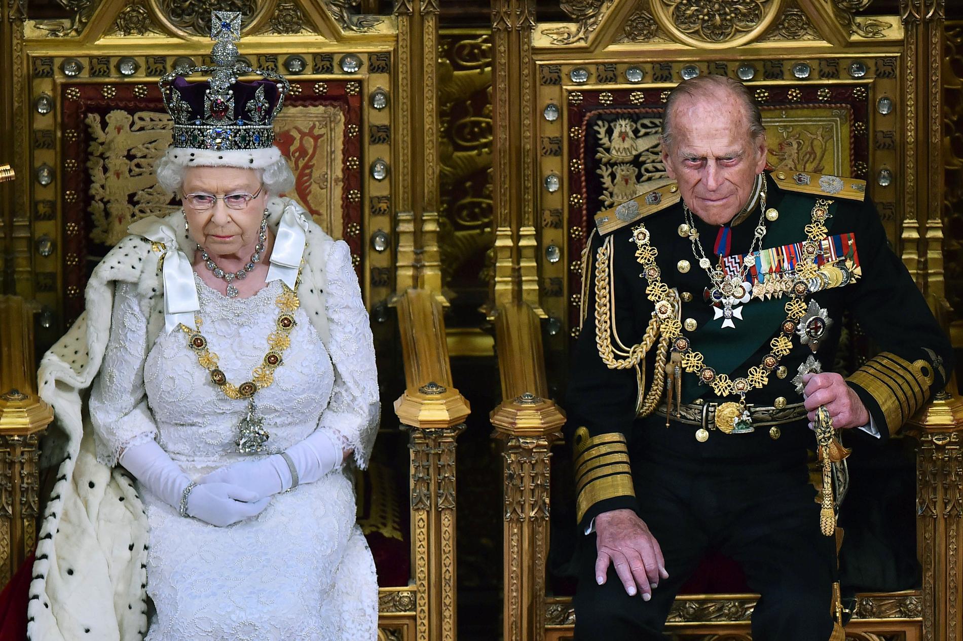 Drottning Elizabeth och prins Philip i samband med öppnandet av parlamentet i Westminster  Palace i London. Arkiv 2015