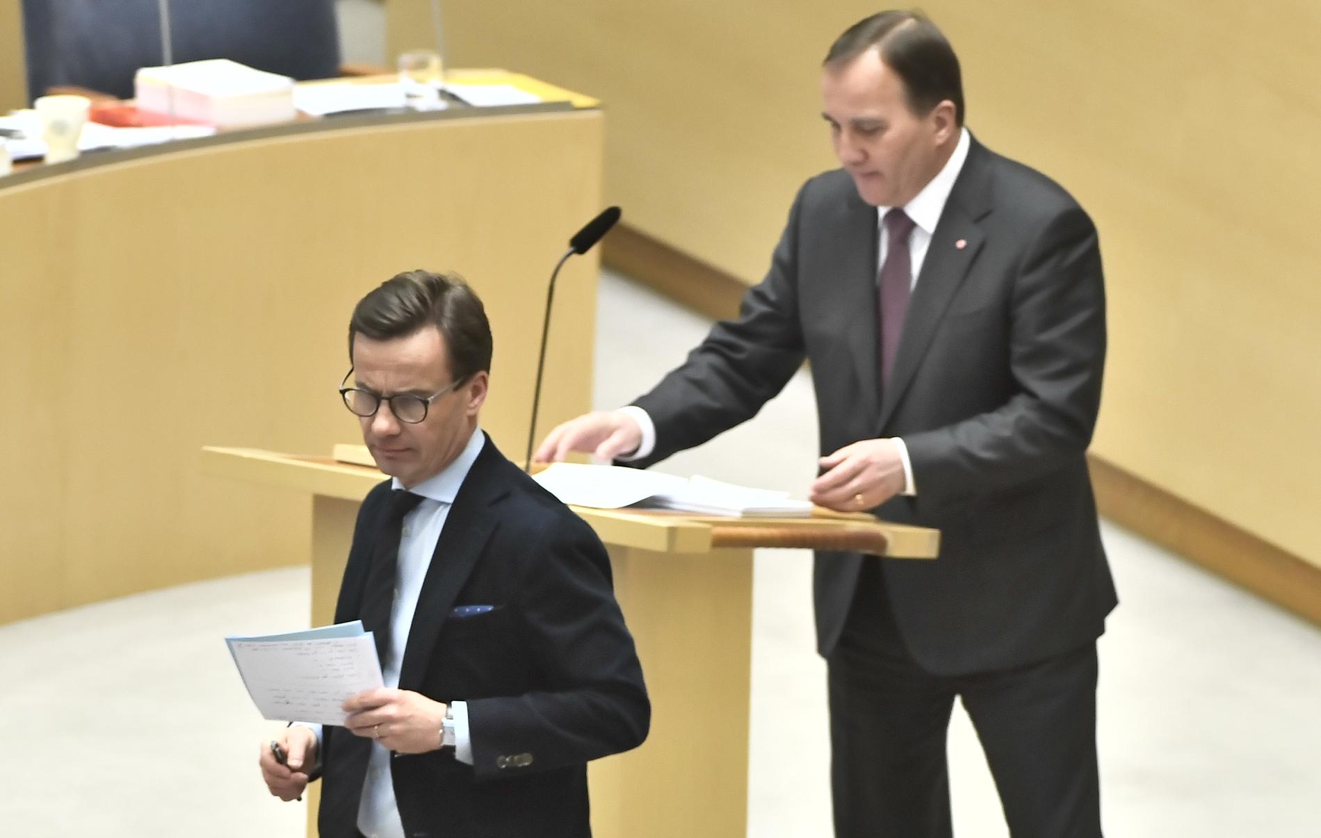 Ulf Kristersson och Stefan Löfven i riksdagen. 