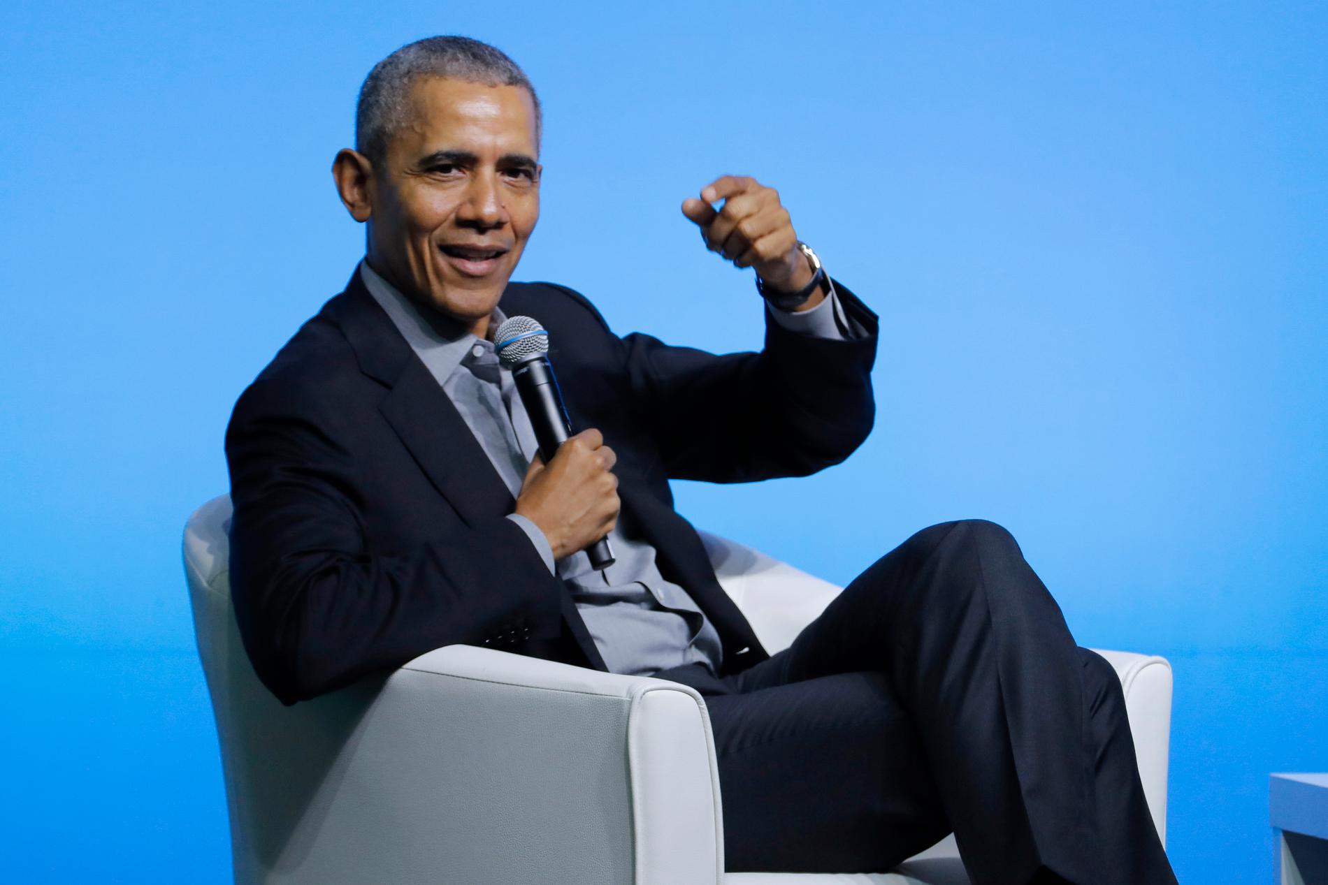 Barack Obama blir först ut att medverka i frun Michelles nya podcast på Spotify. Arkivbild.