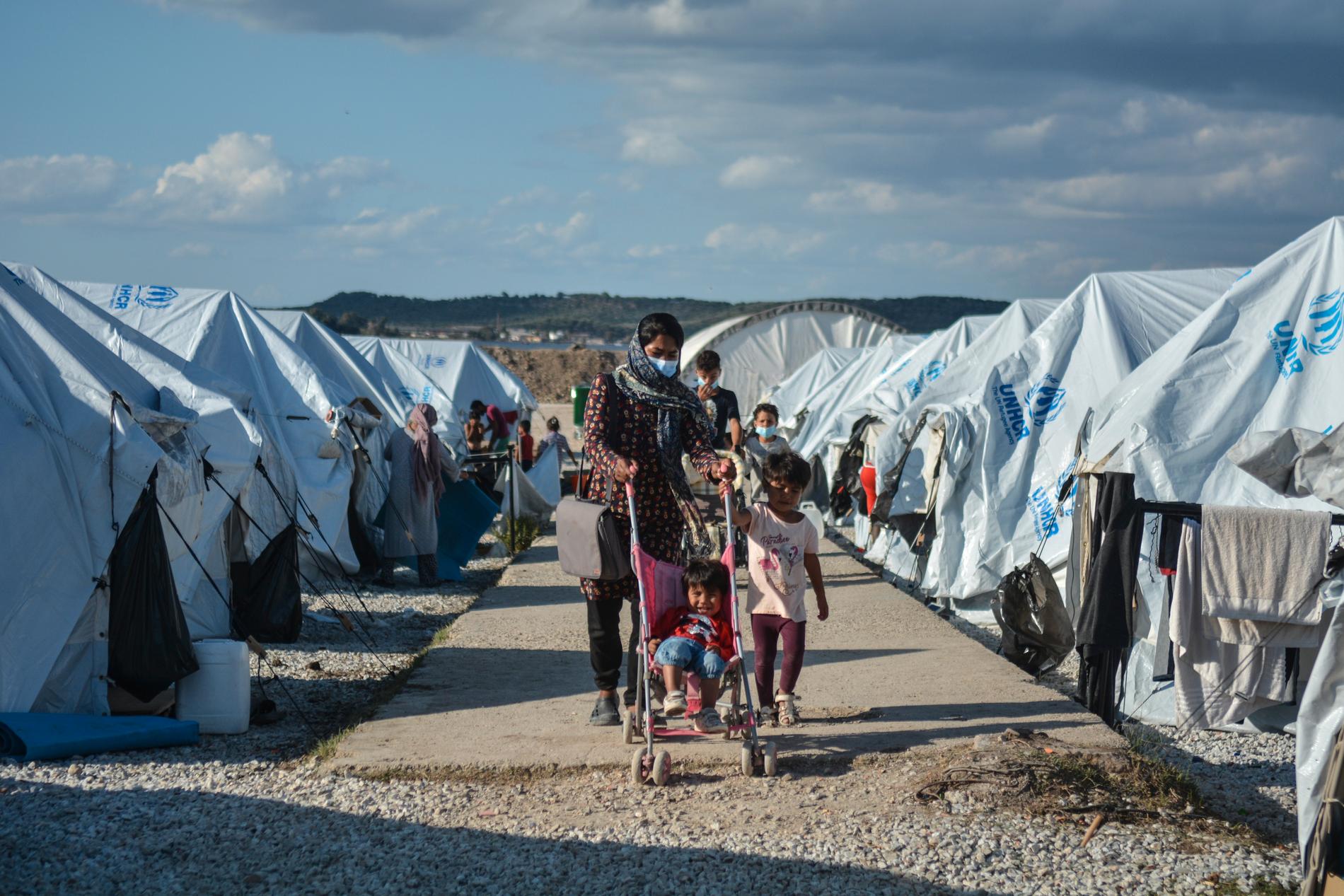 Migranter i ett flyktingläger på den grekiska ön Lesbos under 2020.