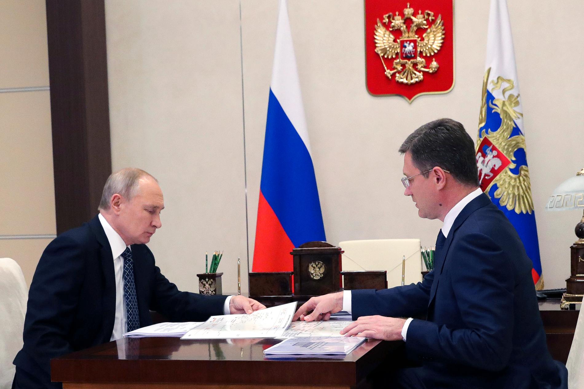 Vladimit Putin och Alexander Novak. Arkivbild.