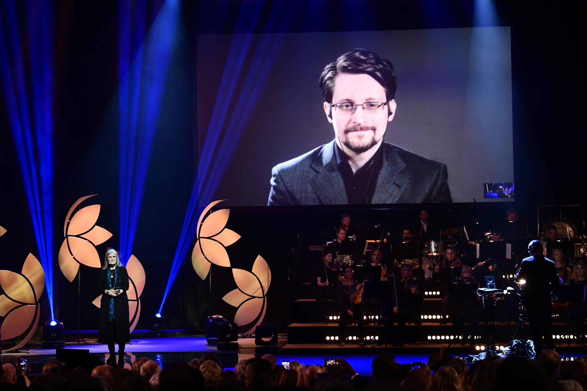 Edward Snowden på storbildsskärm vid utdelningen av Right Livelihood-priset 2019 i Stockholm. Han fick priset 2014. Arkivbild.