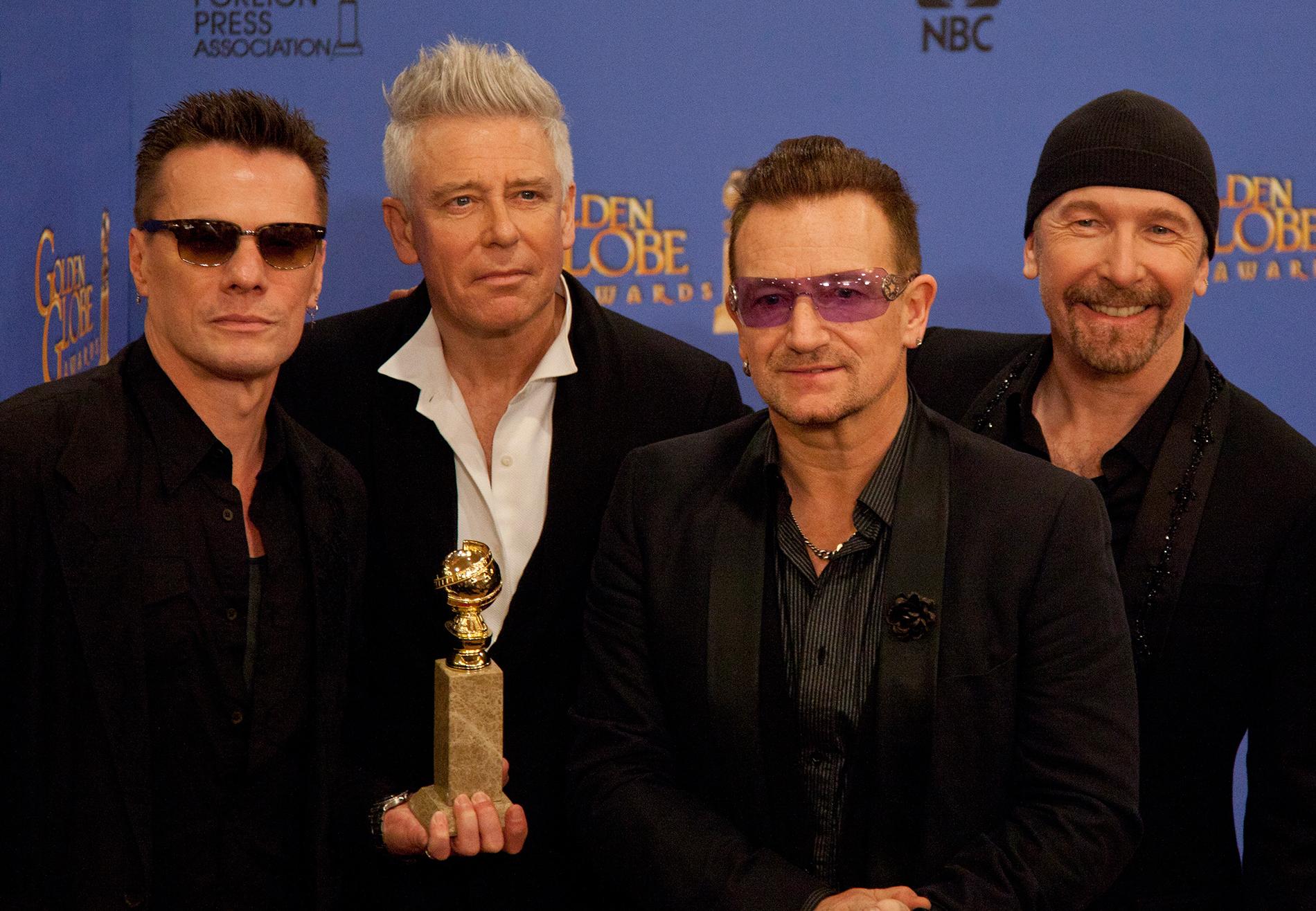 Larry Mullen Jr., Adam Clayton, Bono och The Edge i U2.