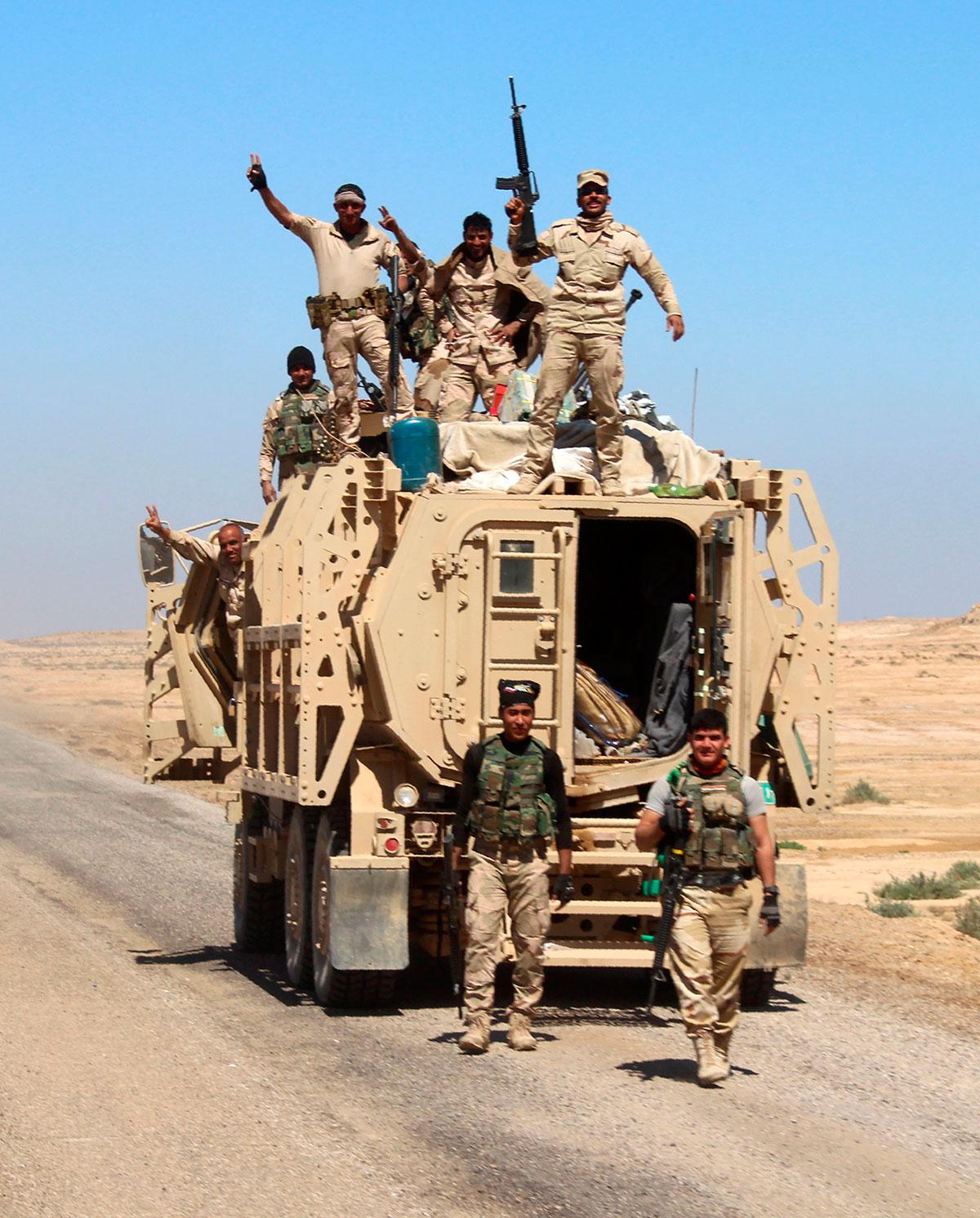 Medlemmar av de irakiska säkerhetsstyrkorna.