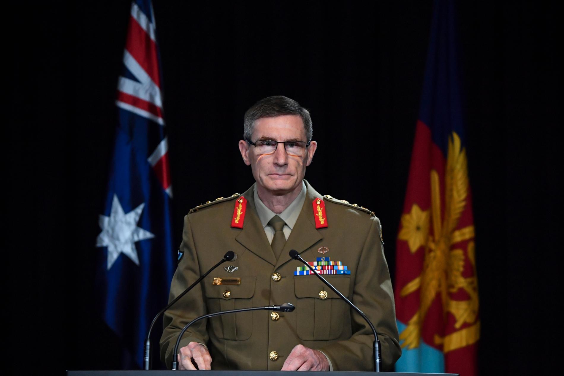 Den australiske försvarschefen Angus Campbell offentliggör resultatet av krigsbrottsutredningen vid en presskonferens.