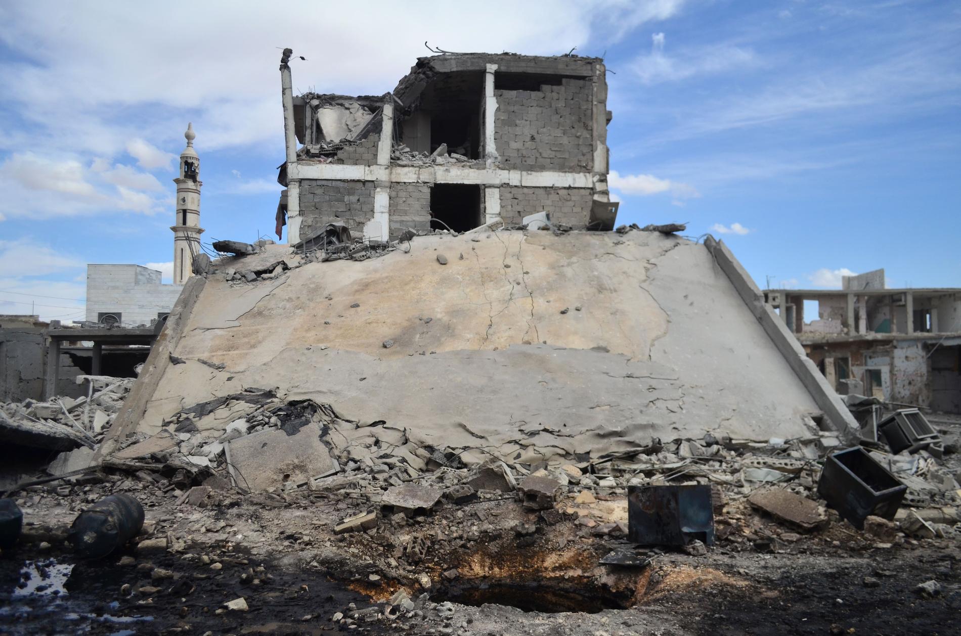 Förstörda byggnader i staden Talbisseh i Homs.