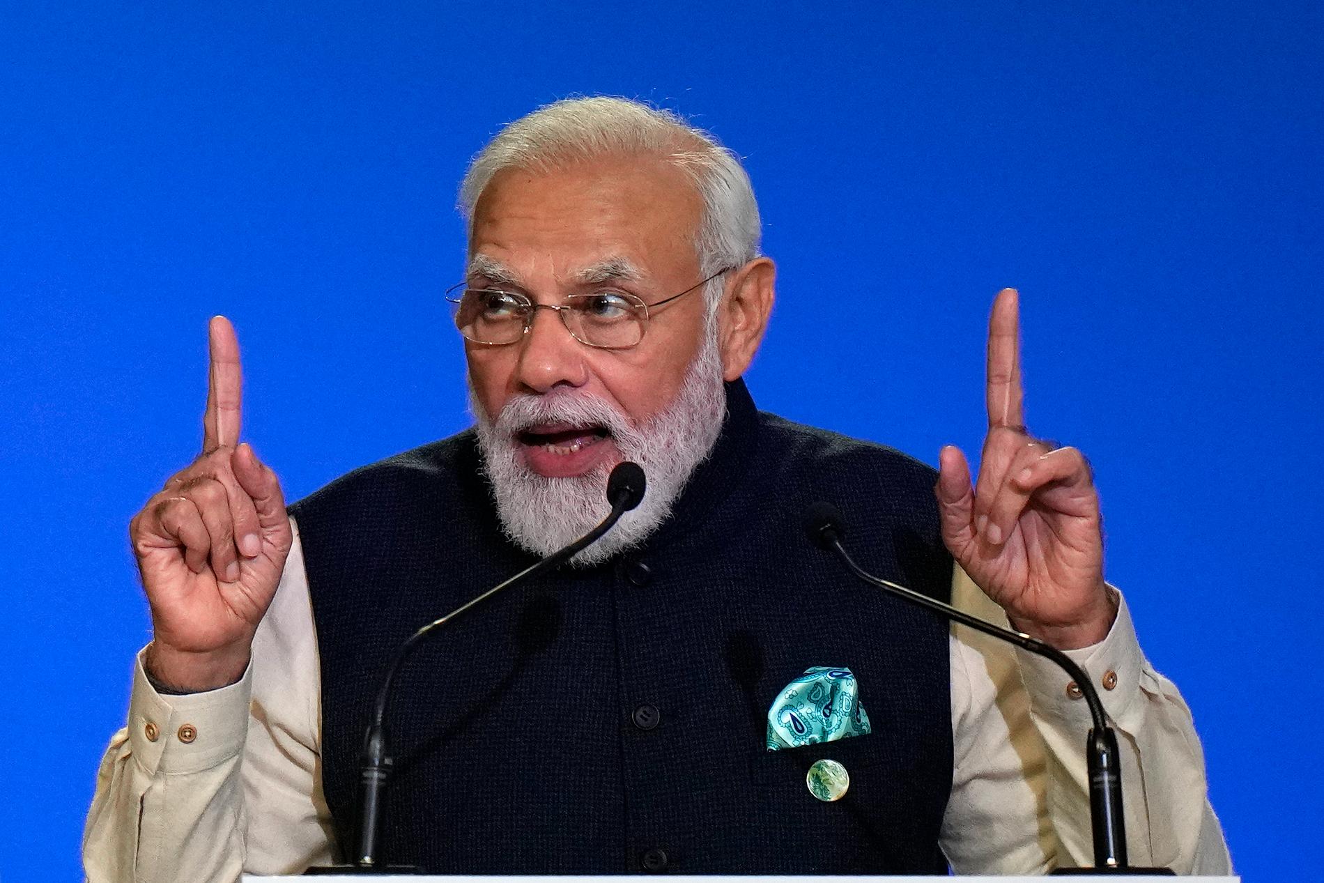 Indiens premiärminister Novandra Modi talar vid klimattoppmötet i Glasgow.
