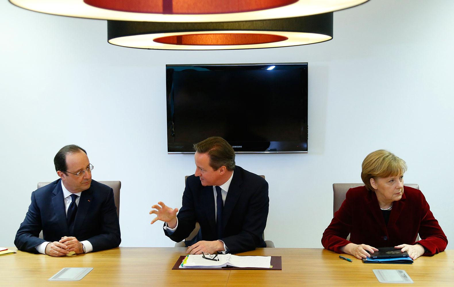 EU-ledarna Hollande, Cameron och Merkel.