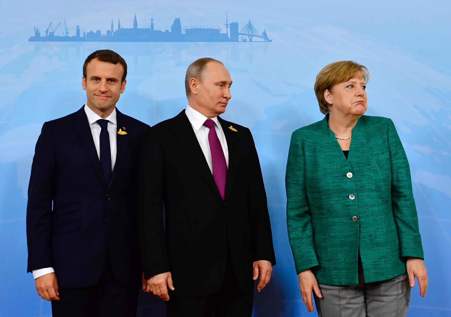 Frankrikes president Emmanuel Macron, Rysslands president Vladimir Putin och Tysklands förbundskansler Angela Merkel ska mötas och diskutera situationen i Syrien. Arkivbild.