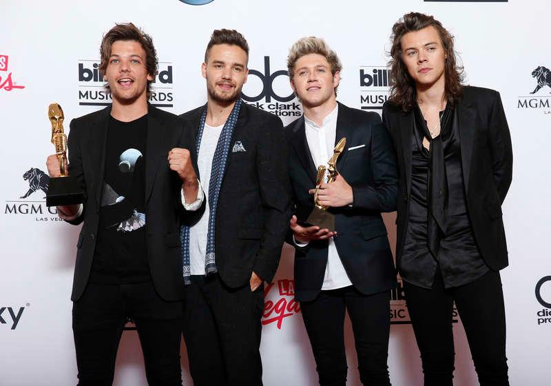 One Direction på Billboard Music Awards i maj. Från vänster: Louis Tomlinson, Liam Payne, Niall Horan och Harry Styles. Romansryktena mellan Tomlinson och Styles har döpts till ”Larry Stylinson” av fansen. Foto: AP