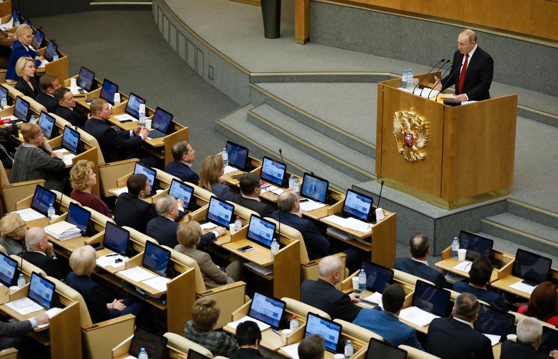 Vladimir Putin i talarstolen på tisdagen.