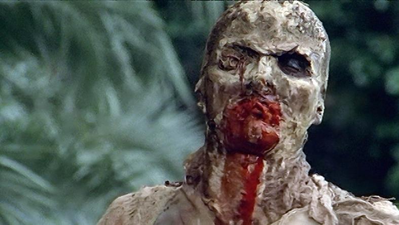 Bild ur klassiska zomibiefilmen ”Zombie flesh eaters”