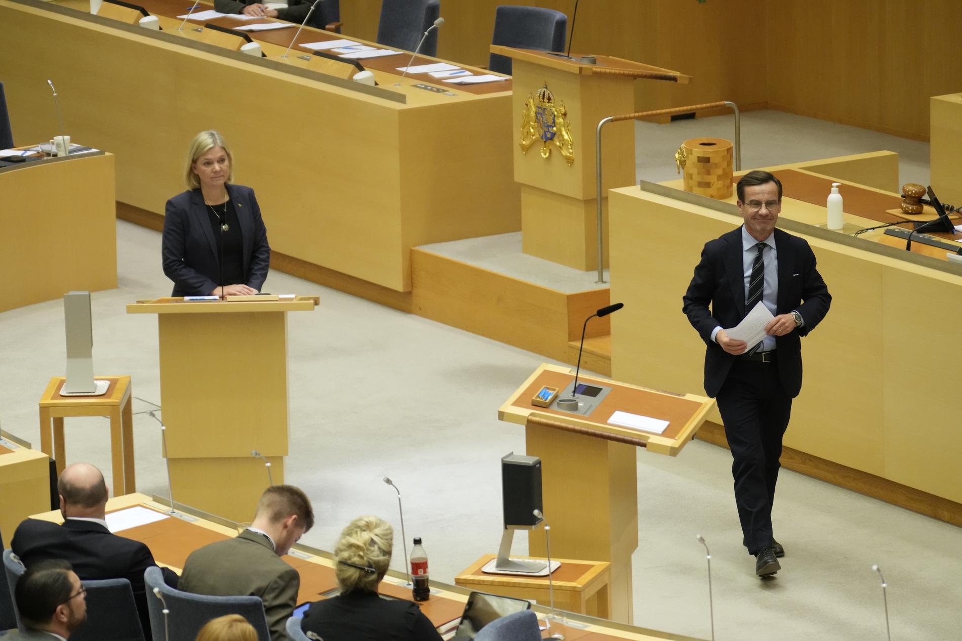 Andersson och Kristersson under partiledardebatten. 