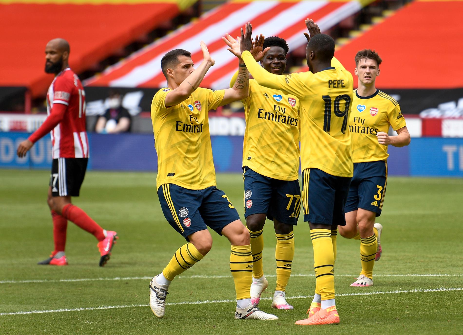 Nicolas Pépé firar sitt straffmål i FA-cupkvartsfinalen borta mot Sheffield United.