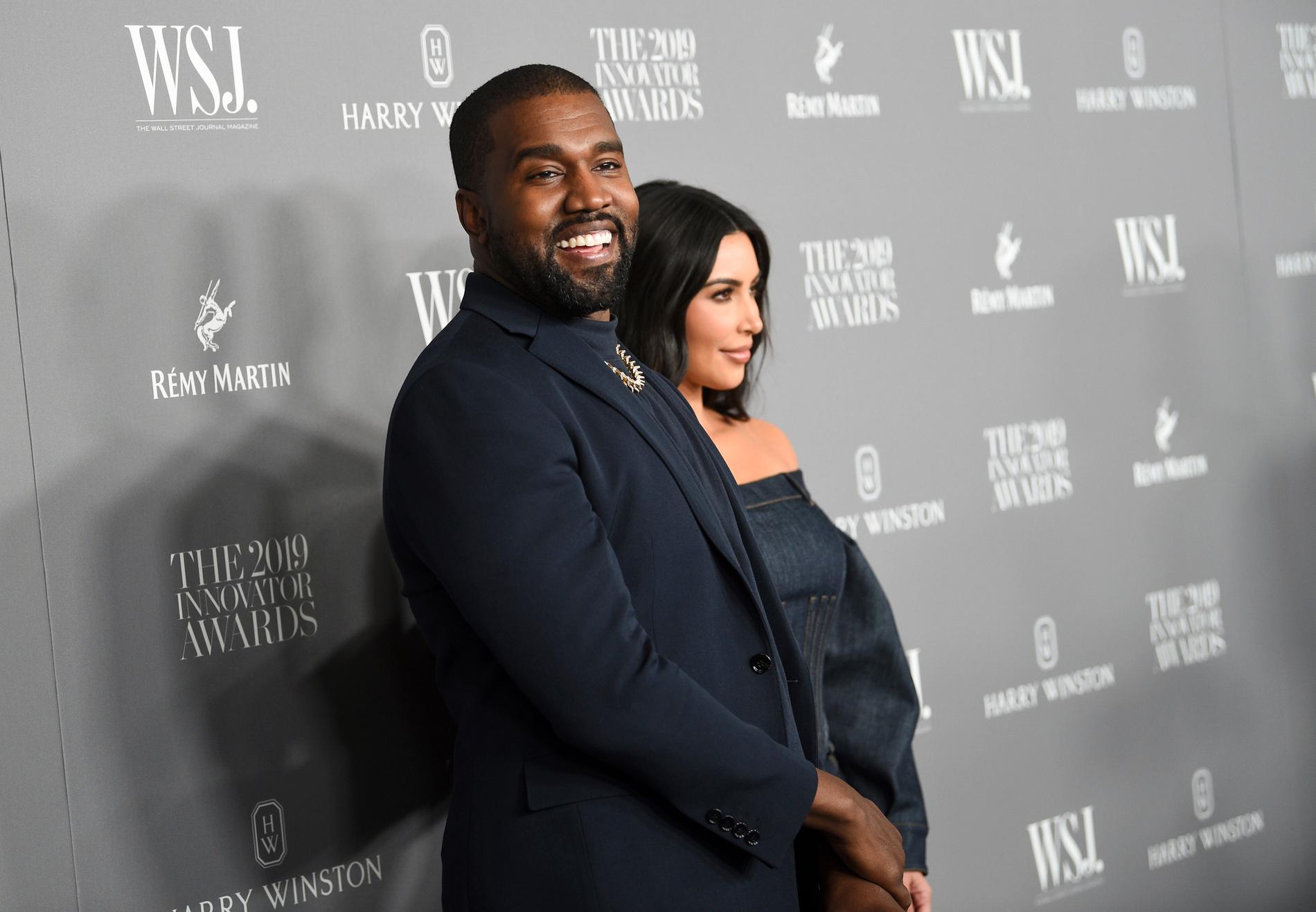 Kanye West tillsammans med sin fru Kim Kardashian i november förra året.