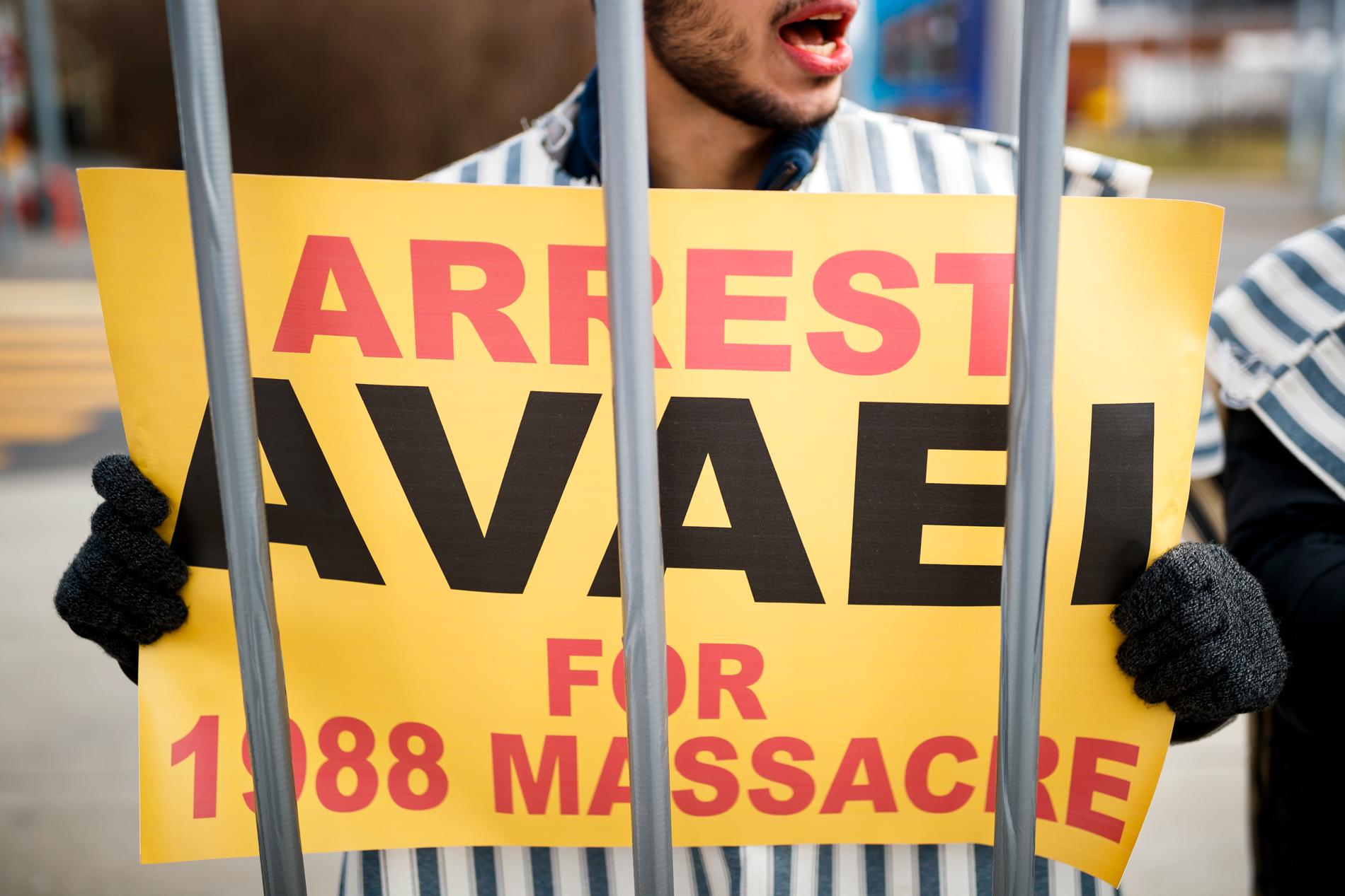 Demonstranter protesterade mot att Irans justitieminister Alireza Avayi medverkade vid mötet i Genève.