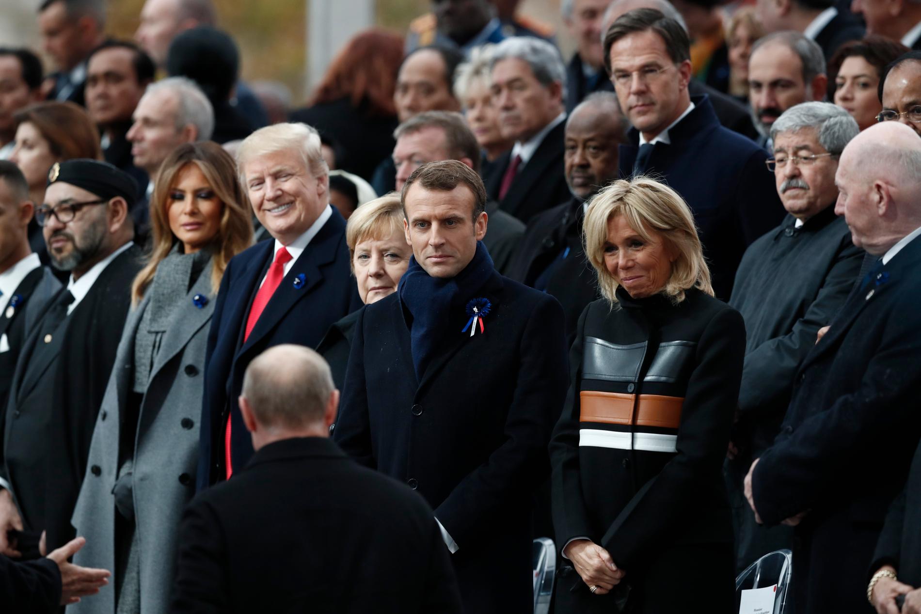 Melania och Donald Trump, Angela Merkel, Emanuel Macron och frun Brigitte Macron under ceremonin. 