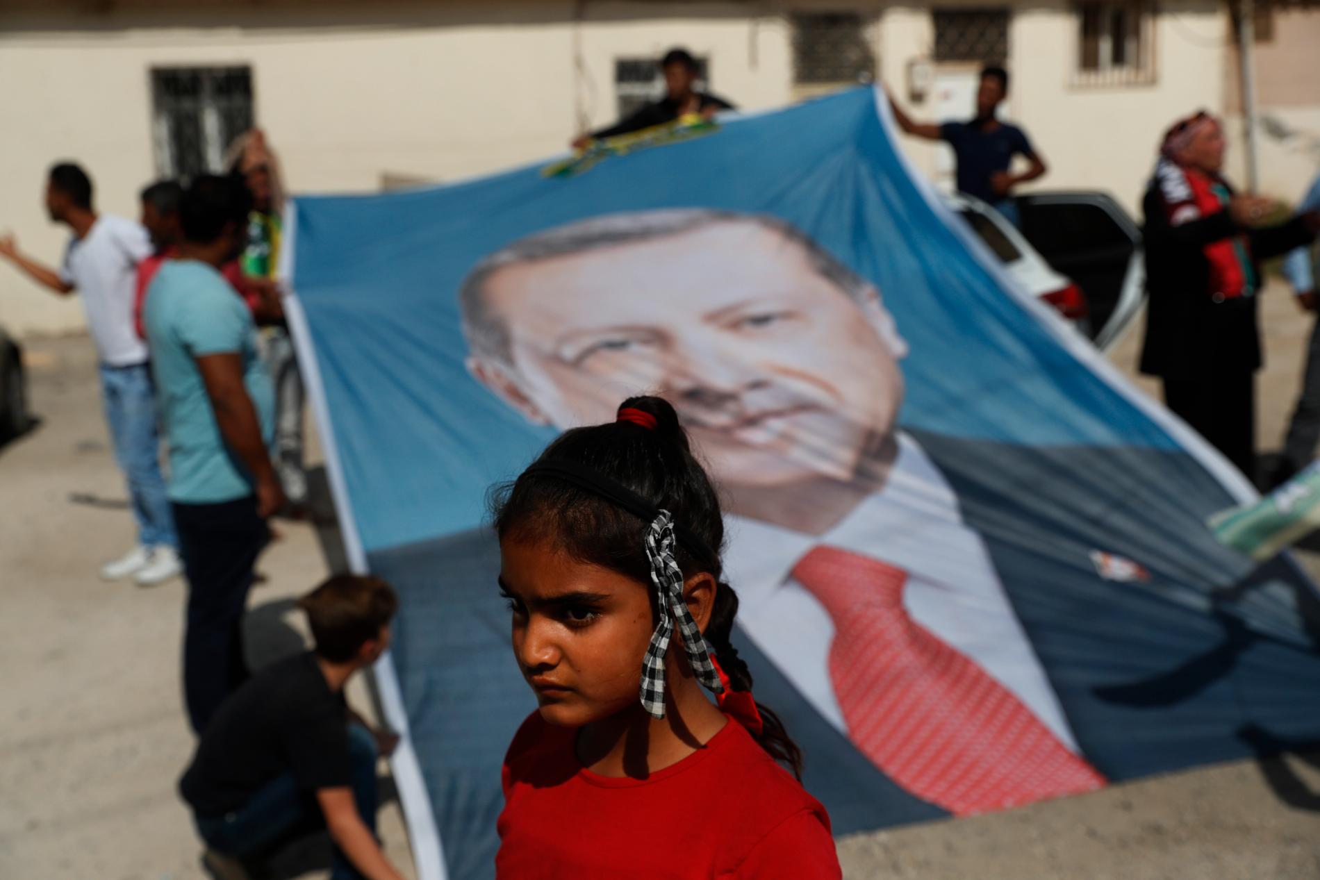 President Erdogan på en flagga under en manifestation för Erdogan i sydöstra Turkiet.