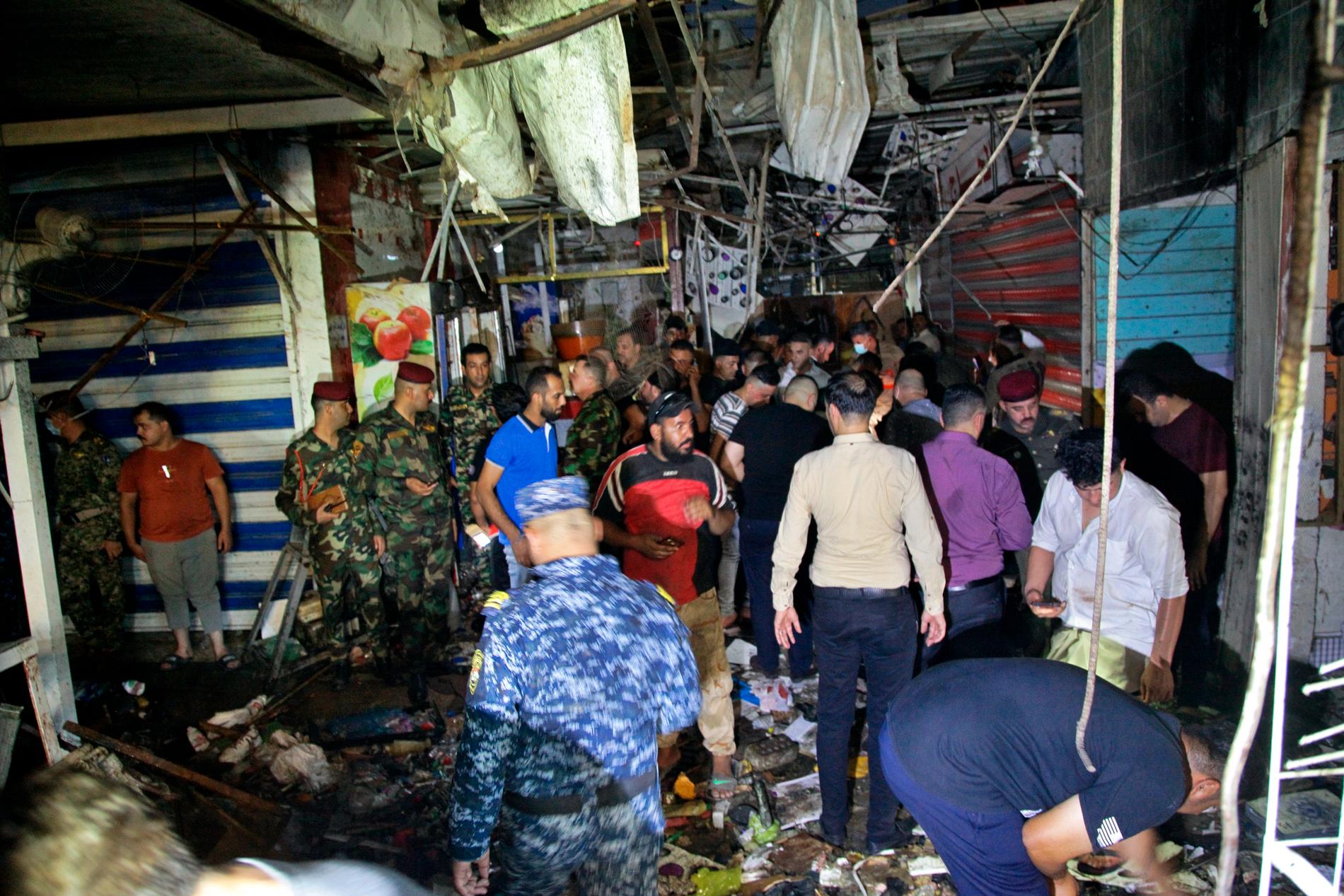 Förödelse efter bombdådet på marknadsplatsen i Sadrstaden, Bagdad.
