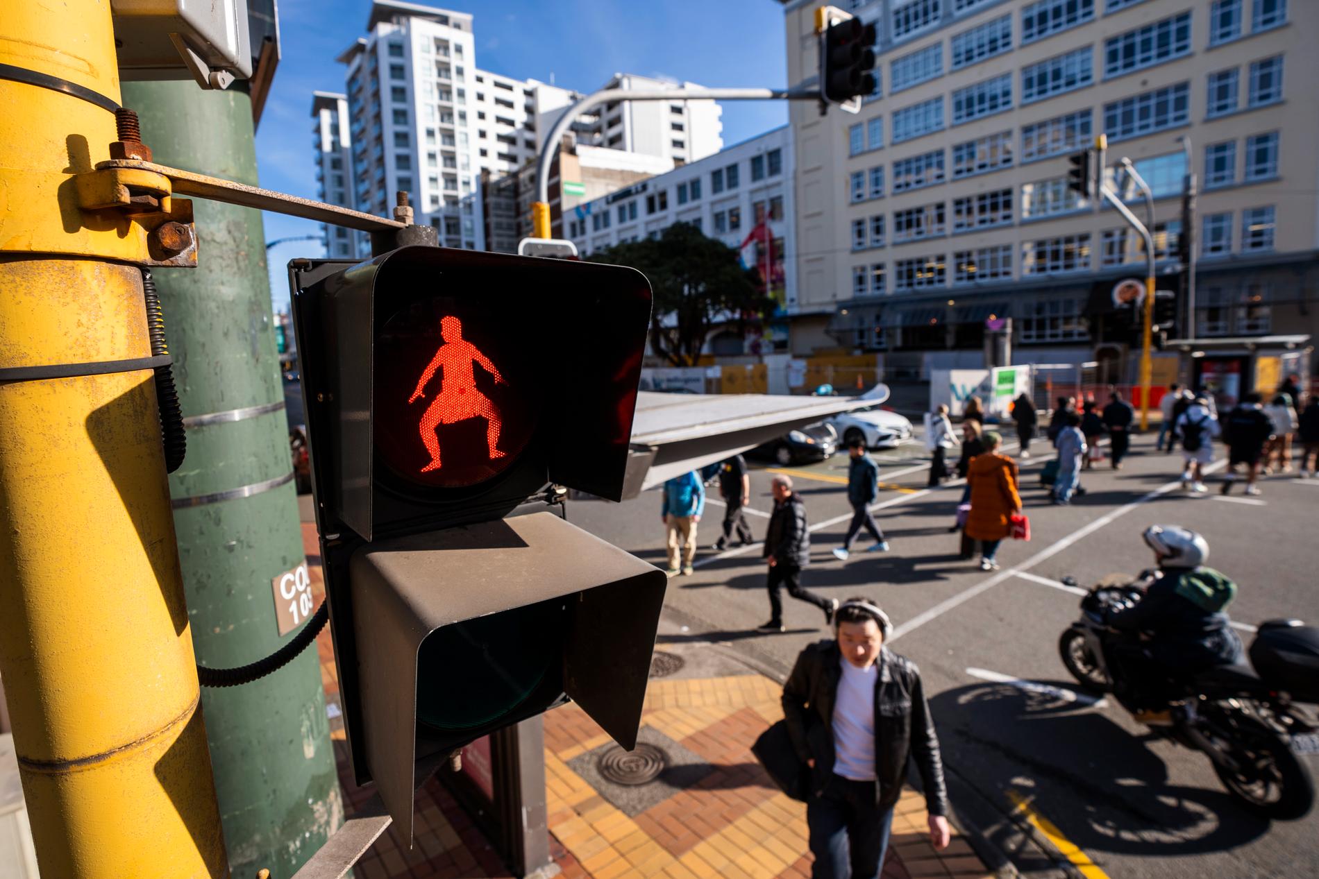 Trafikljus med maorisk figur i Wellington, Nya Zeeland. 