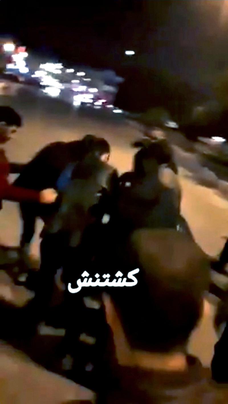 En video som Reuters kommit över inifrån Iran sägs visa hur en skadad man bärs iväg. 